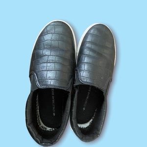 Shoes-black with white outline.